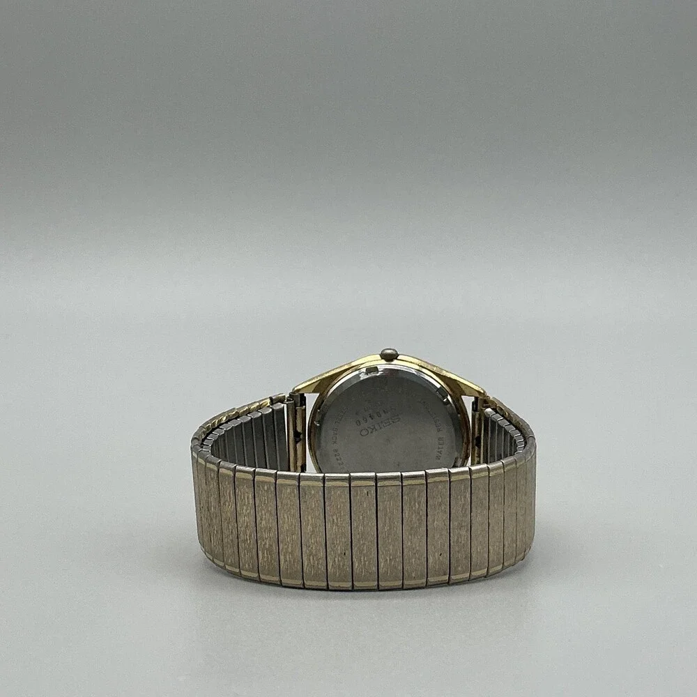 Vintage Seiko Mens Watch 34mm Gold Tone Stretch Band Date 8222-7009 New Battery